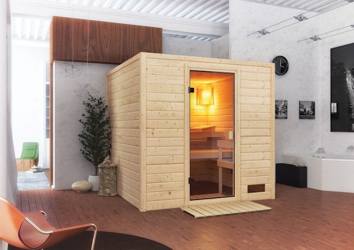 Karibu Woodfeeling Sauna Jara - 38 mm Massivholz Aktionssauna inkl. gratis Saunaofen & 8-teiligem Zubehörpaket (Gesamtwert 1071,91€) Bild